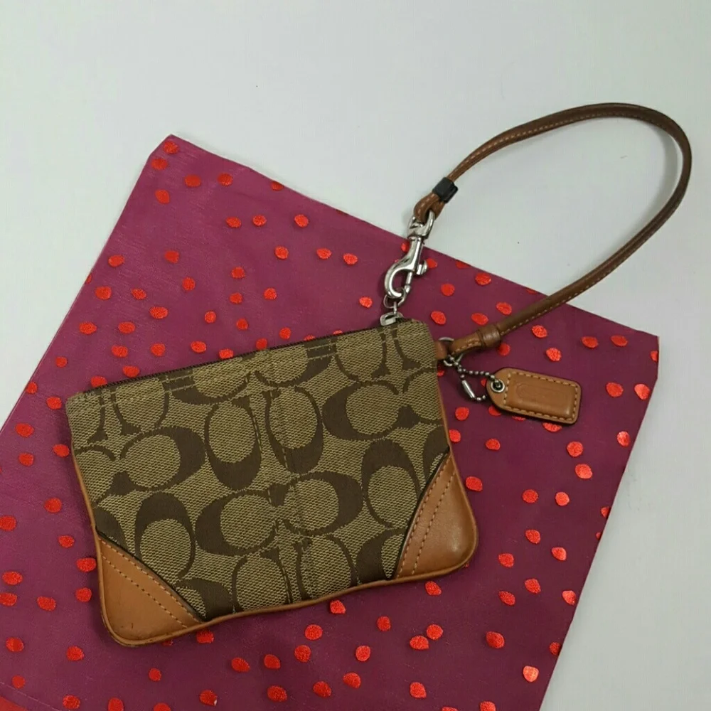 Coach brown canvas wristlet